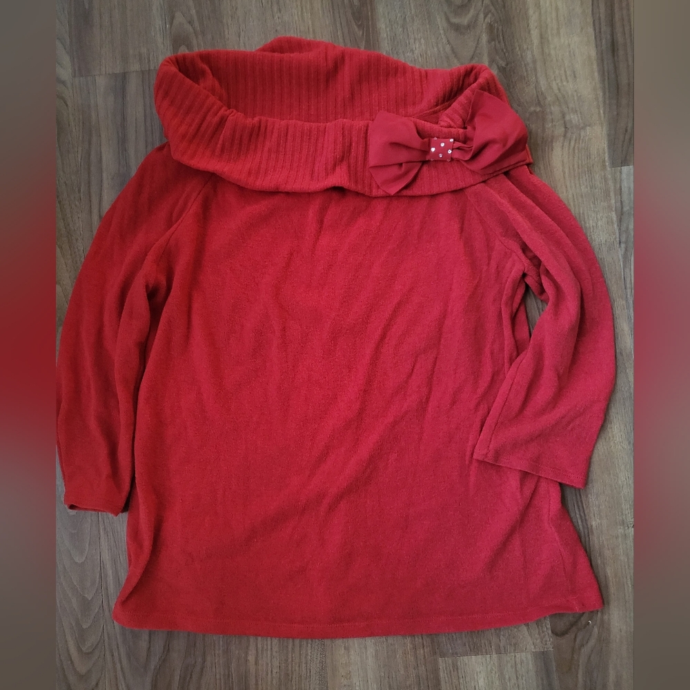 Red holiday sweater with bow
